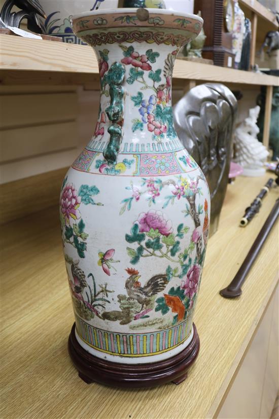 A Chinese famille rose vase on stand height excl. stand 44cm